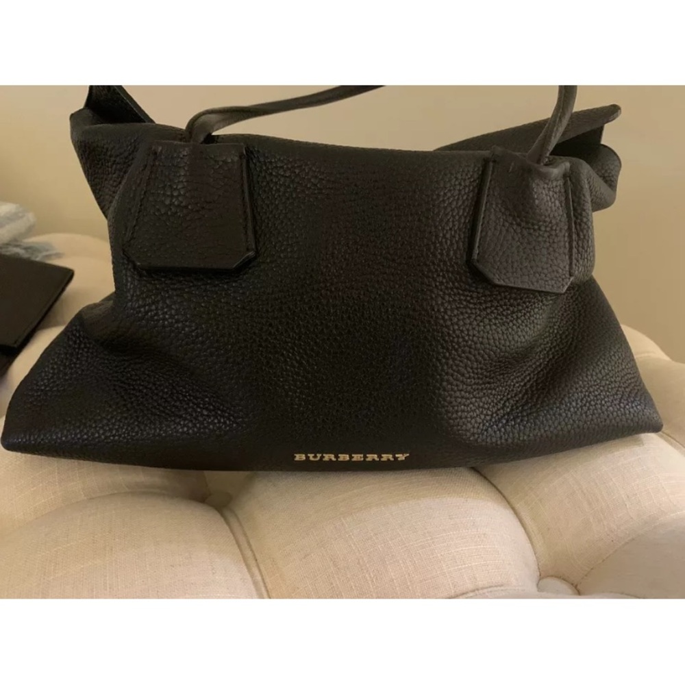 Beautiful Burberry Handbag Authentic

Minor scratches small dots hard to notice